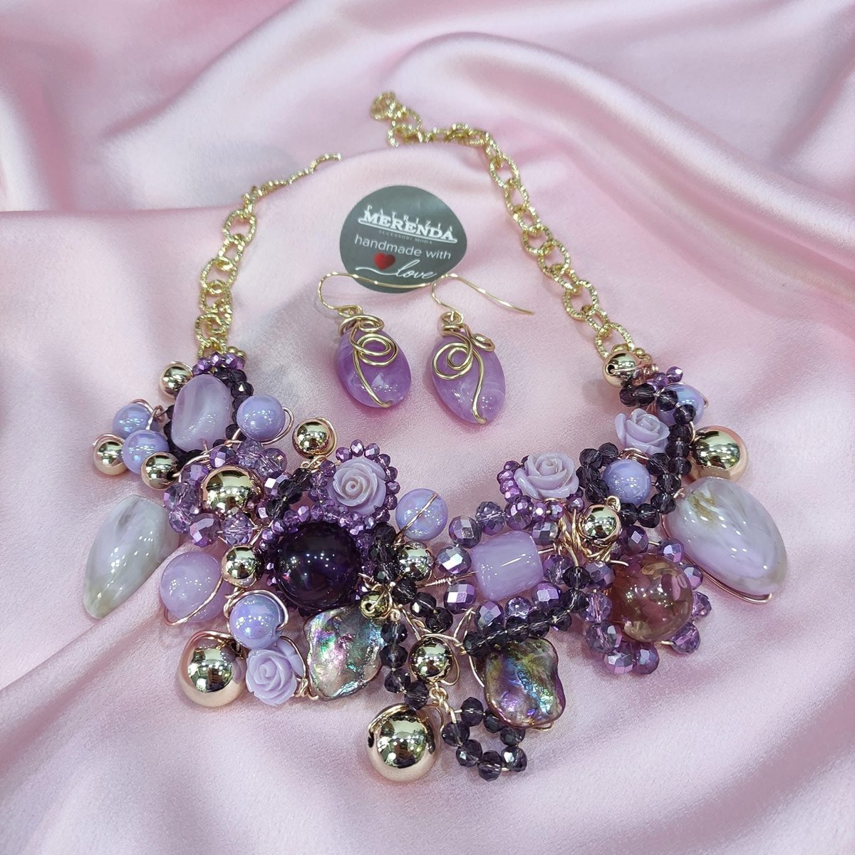 Parure collana e orecchini viola