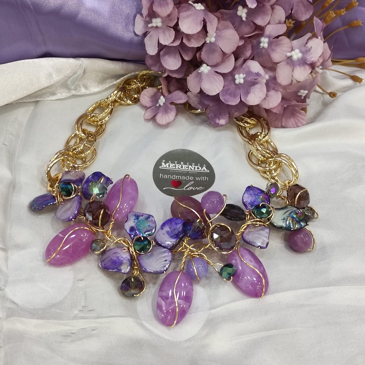 Collana rosa e viola