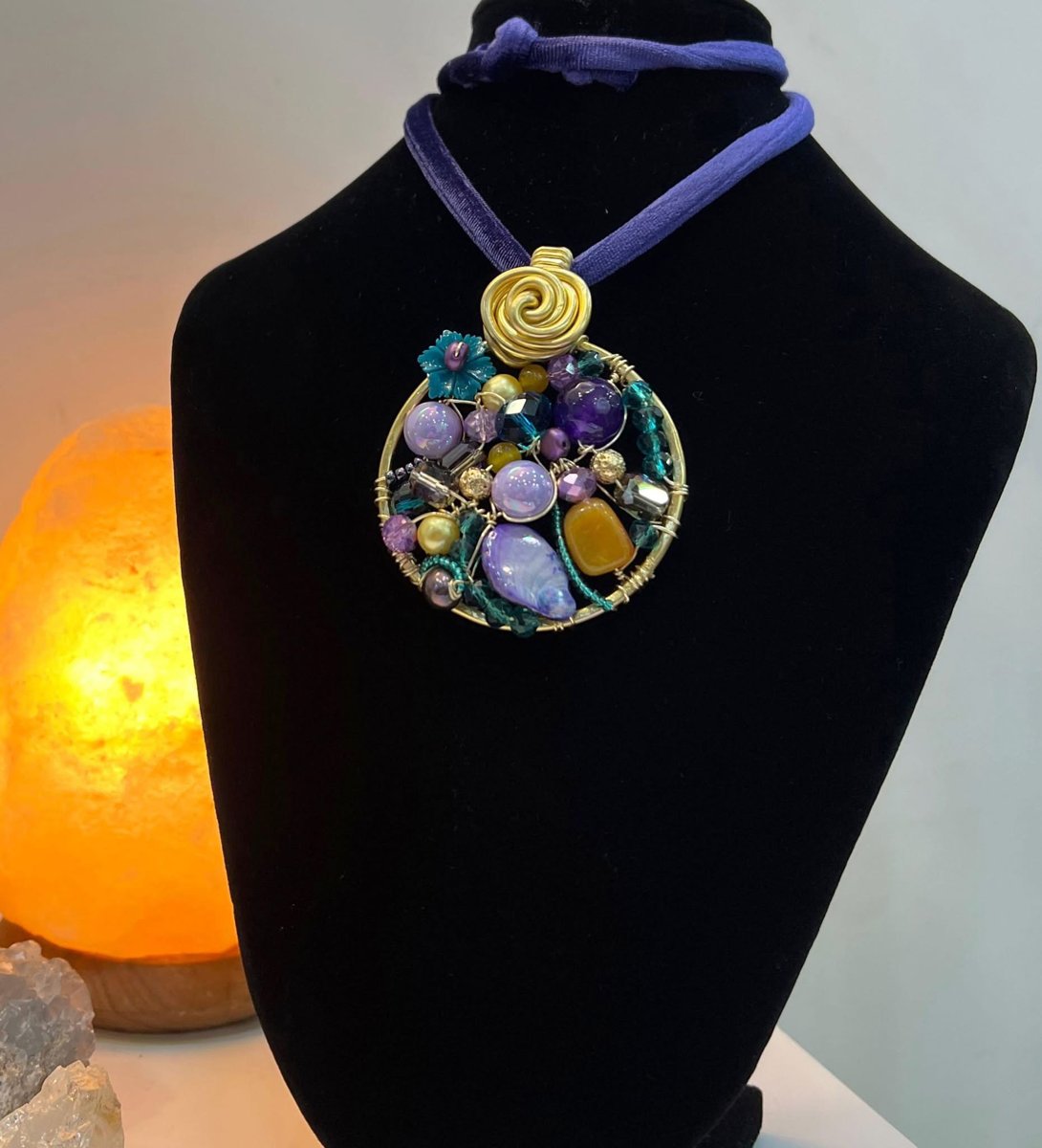 Ciondolo rotondo viola